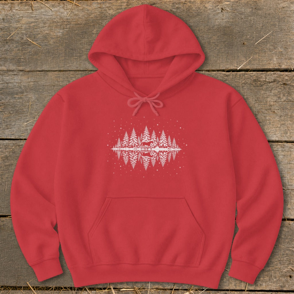 Red hoodie with a white forest and deer graphic reflected in water.