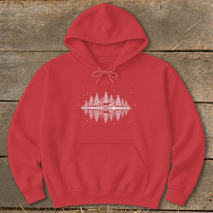Red hoodie with a white forest and deer graphic reflected in water.