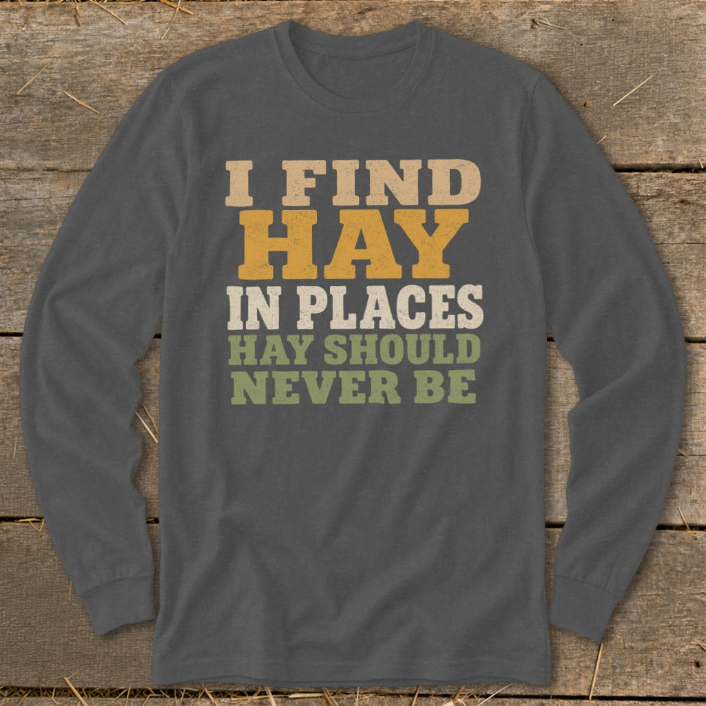 Dark gray long sleeve shirt with "I FIND HAY IN PLACES HAY SHOULD NEVER BE" text.