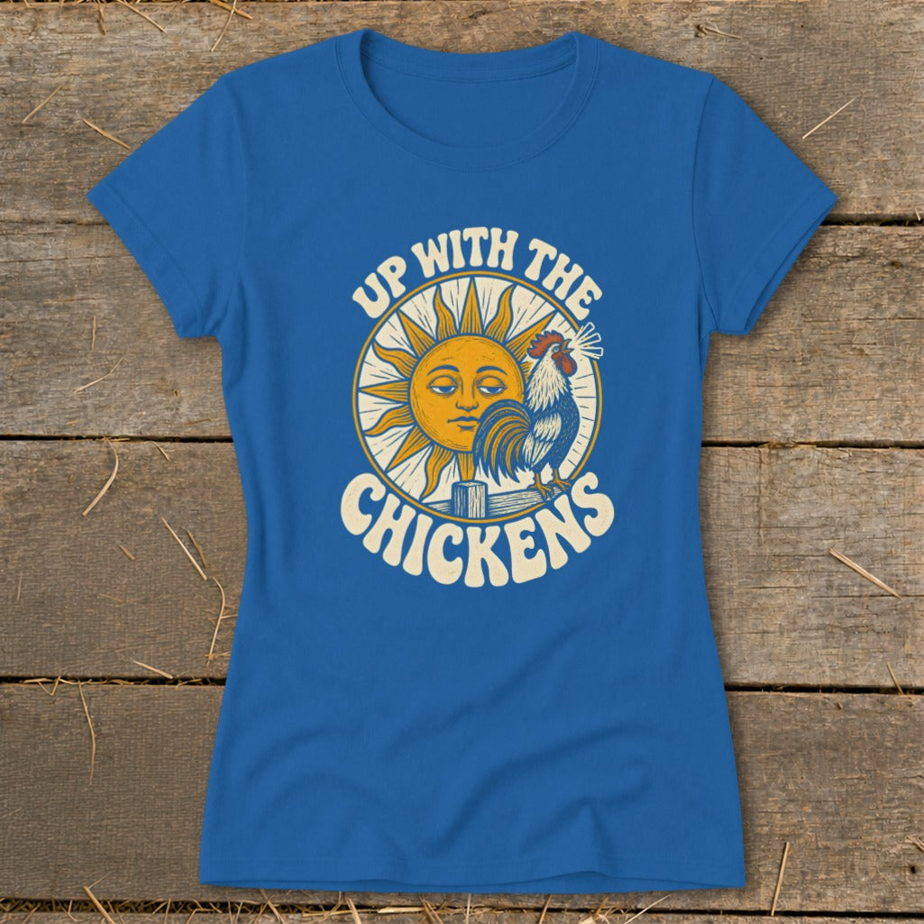 Royal blue t-shirt featuring a retro graphic of a sun, a rooster, and the text Up With The Chickens.