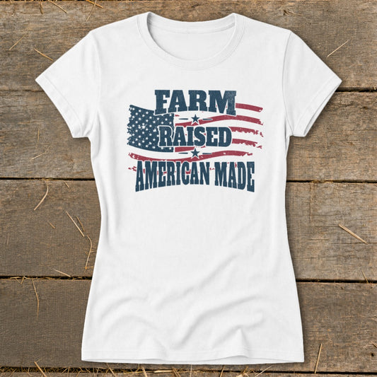 White t-shirt with distressed US flag graphic and text "FARM RAISED AMERICAN MADE".
