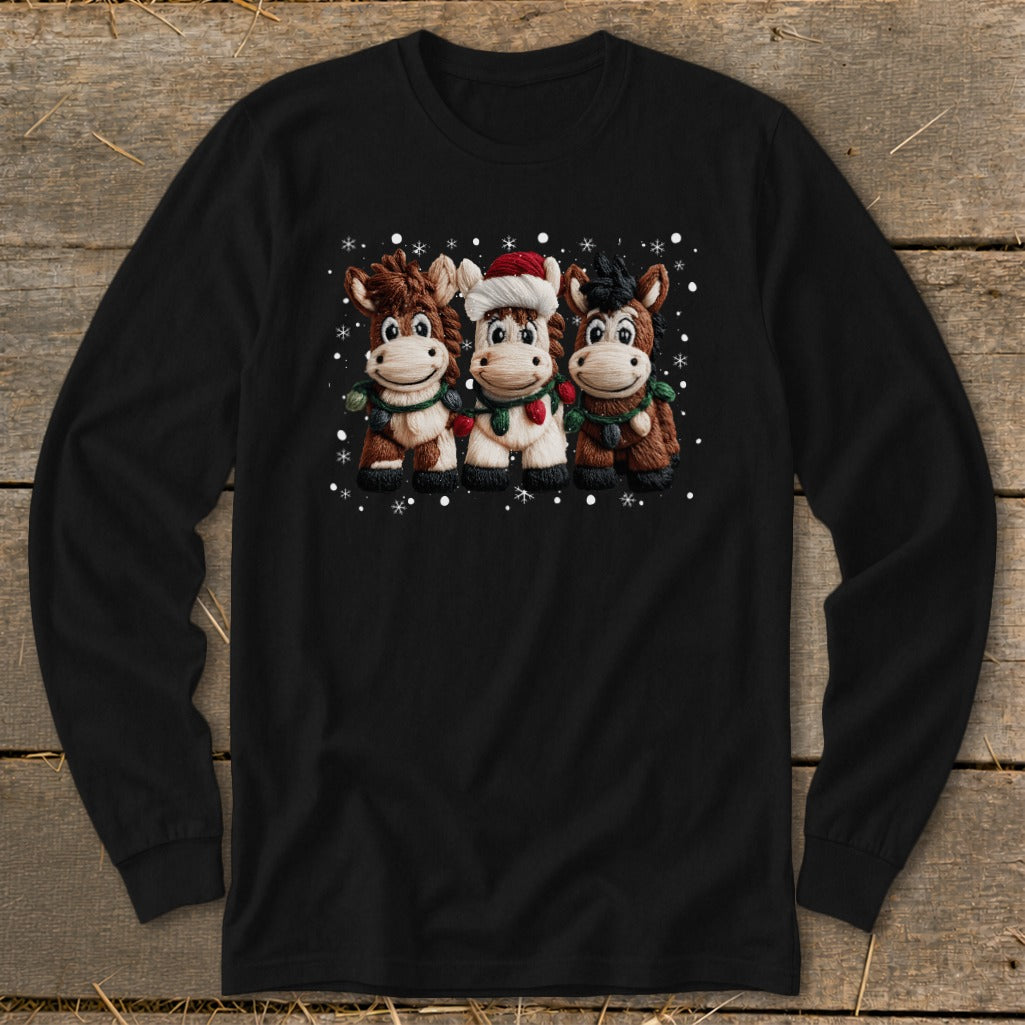 Three cartoon horses in Christmas attire with snowflakes and lights.