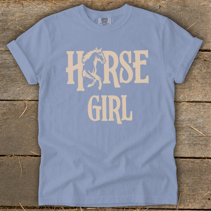Light blue t-shirt with tan "Horse Girl" graphic and horse silhouette.