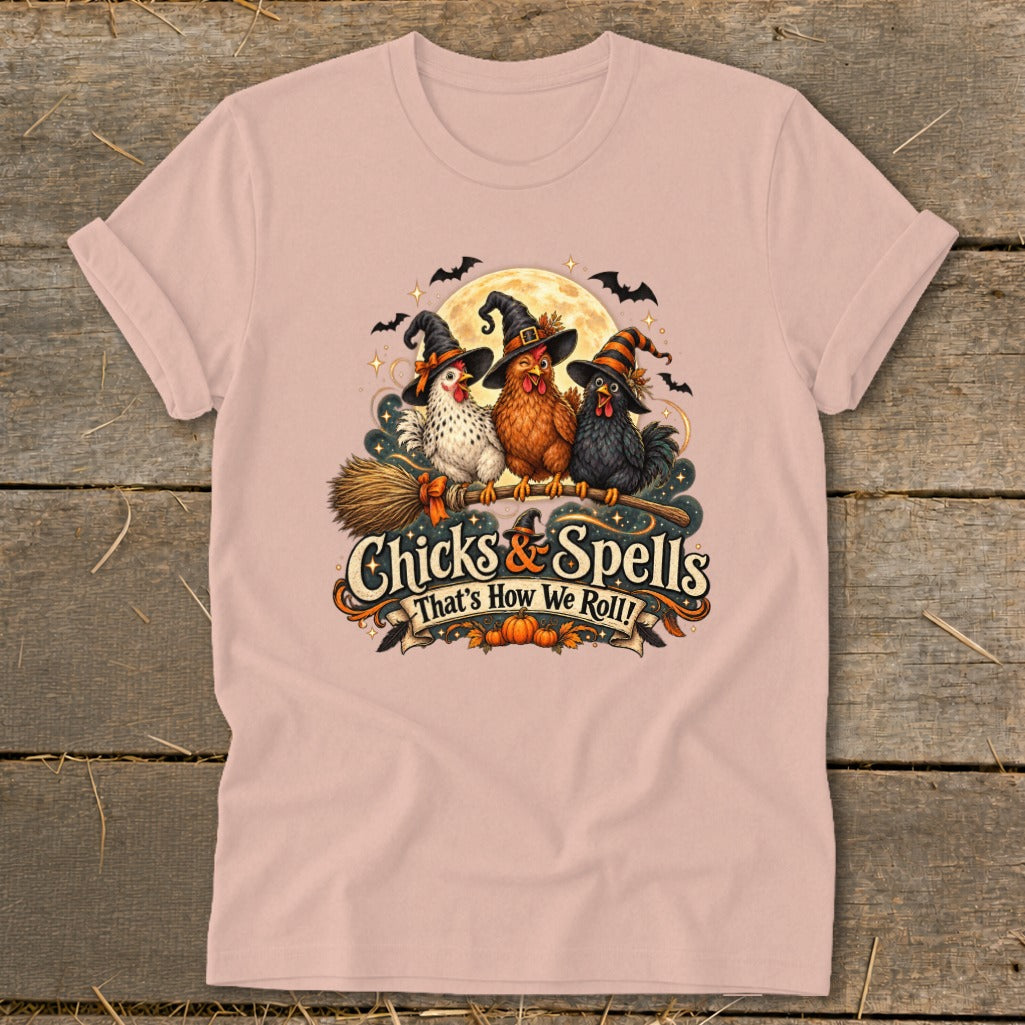 Three chickens in witch hats on a broom with "Chicks & Spells" text.