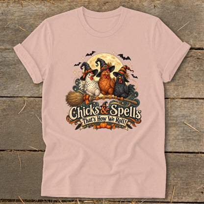 Three chickens in witch hats on a broom with "Chicks & Spells" text.