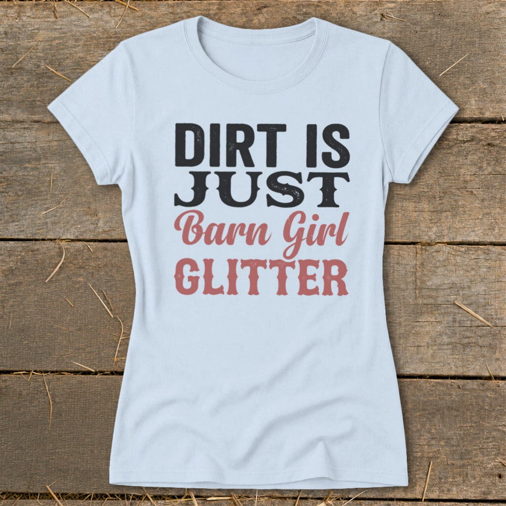 Light blue t-shirt with black text "DIRT IS JUST" and red text "Barn Girl GLITTER".