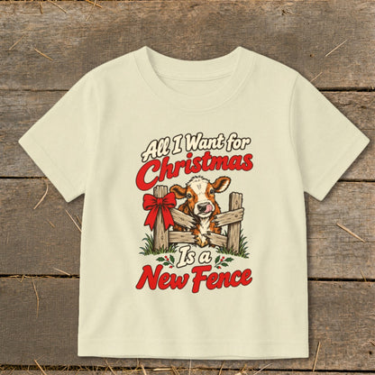 Cream t-shirt with text "All I Want for Christmas Is a New Fence" and a cow.