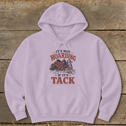 Light purple hoodie with "It's Not Hoarding If It's Tack" text and horse tack illustration.