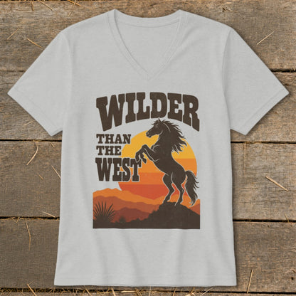 T-shirt graphic: "Wilder Than The West" text with silhouette of a horse and sunset.