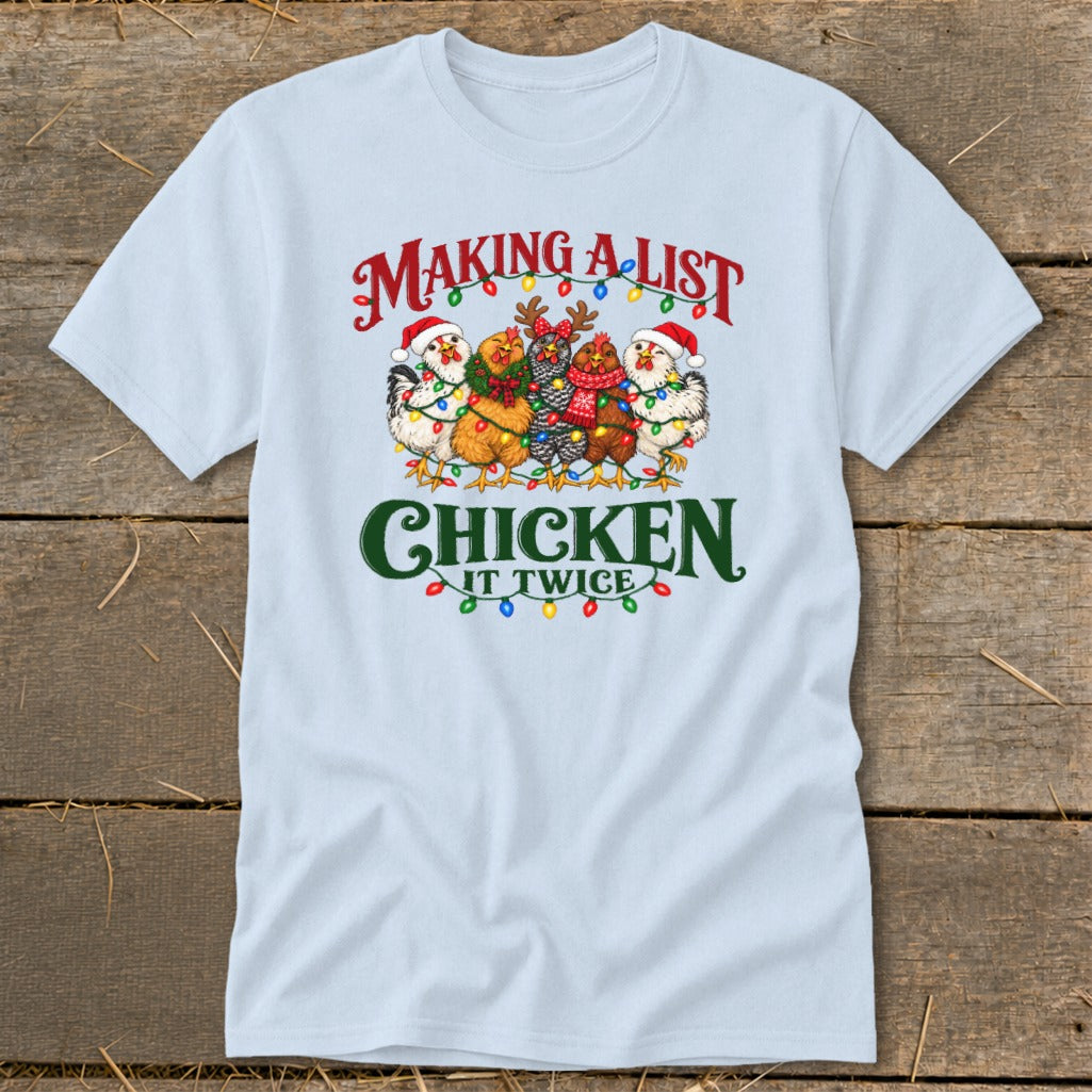 Light blue t-shirt with "Making a list, chicken it twice" and cartoon chickens in Christmas hats.