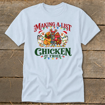 Light blue t-shirt with "Making a list, chicken it twice" and cartoon chickens in Christmas hats.