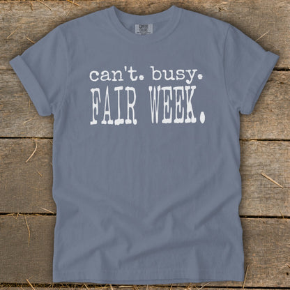 Grey t-shirt with white text "can't. busy. FAIR WEEK."