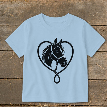 Light blue children's t-shirt featuring a black graphic of a horse head inside a heart outline.