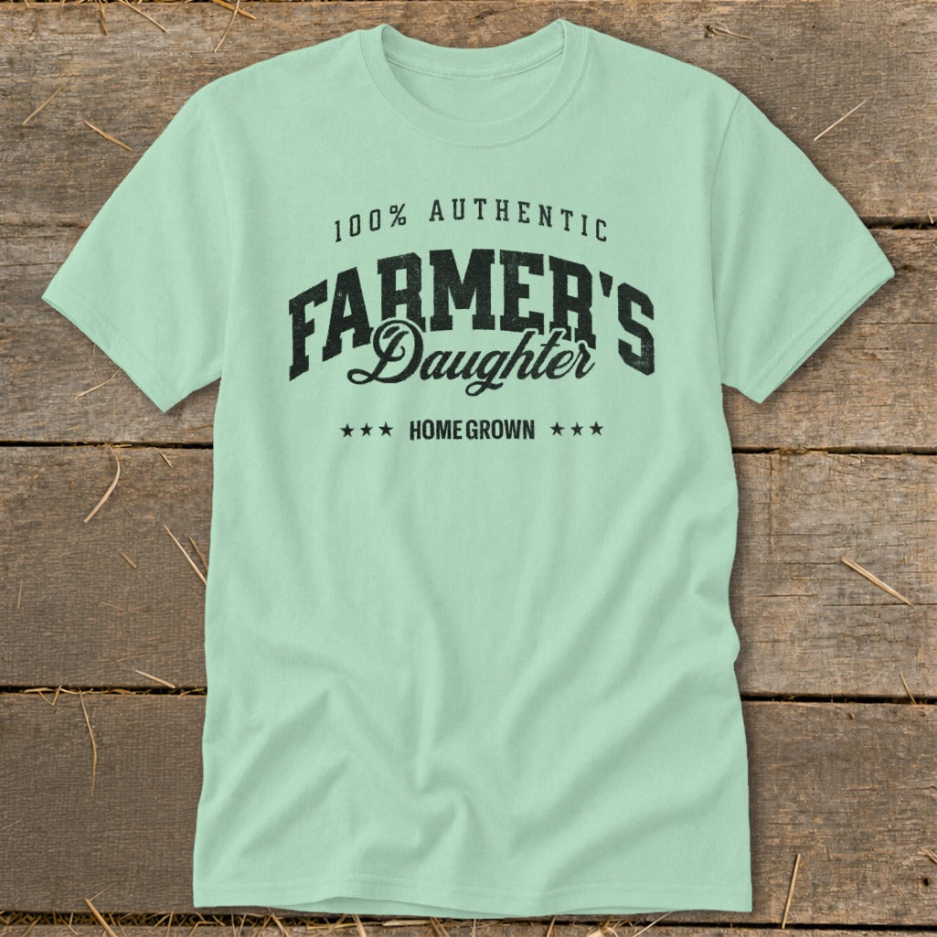 Light blue t-shirt with "100% Authentic Farmer's Daughter Home Grown" text.