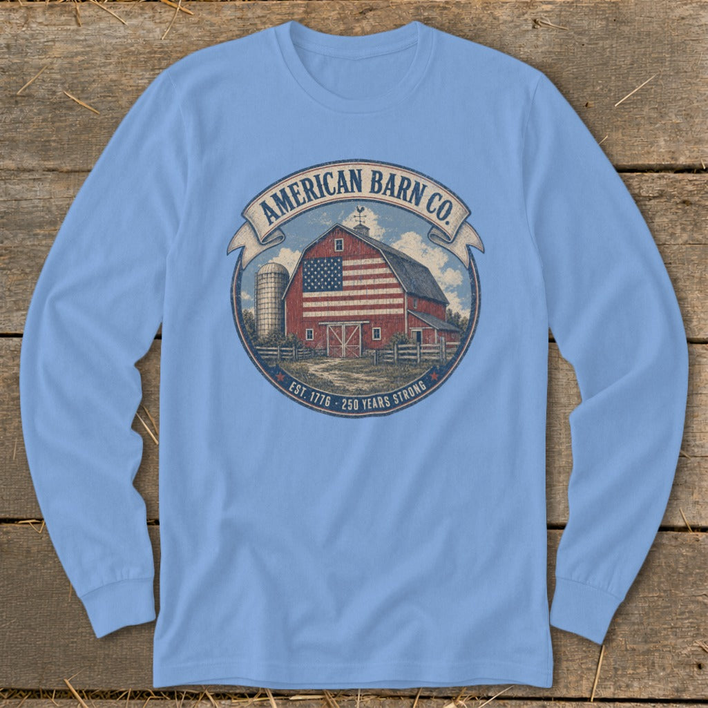 Long-sleeve light blue t-shirt with American Barn Co. logo featuring a barn and flag.
