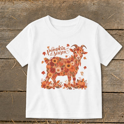 White t-shirt featuring a goat made of autumnal flowers and leaves with "pumpkin season" text.