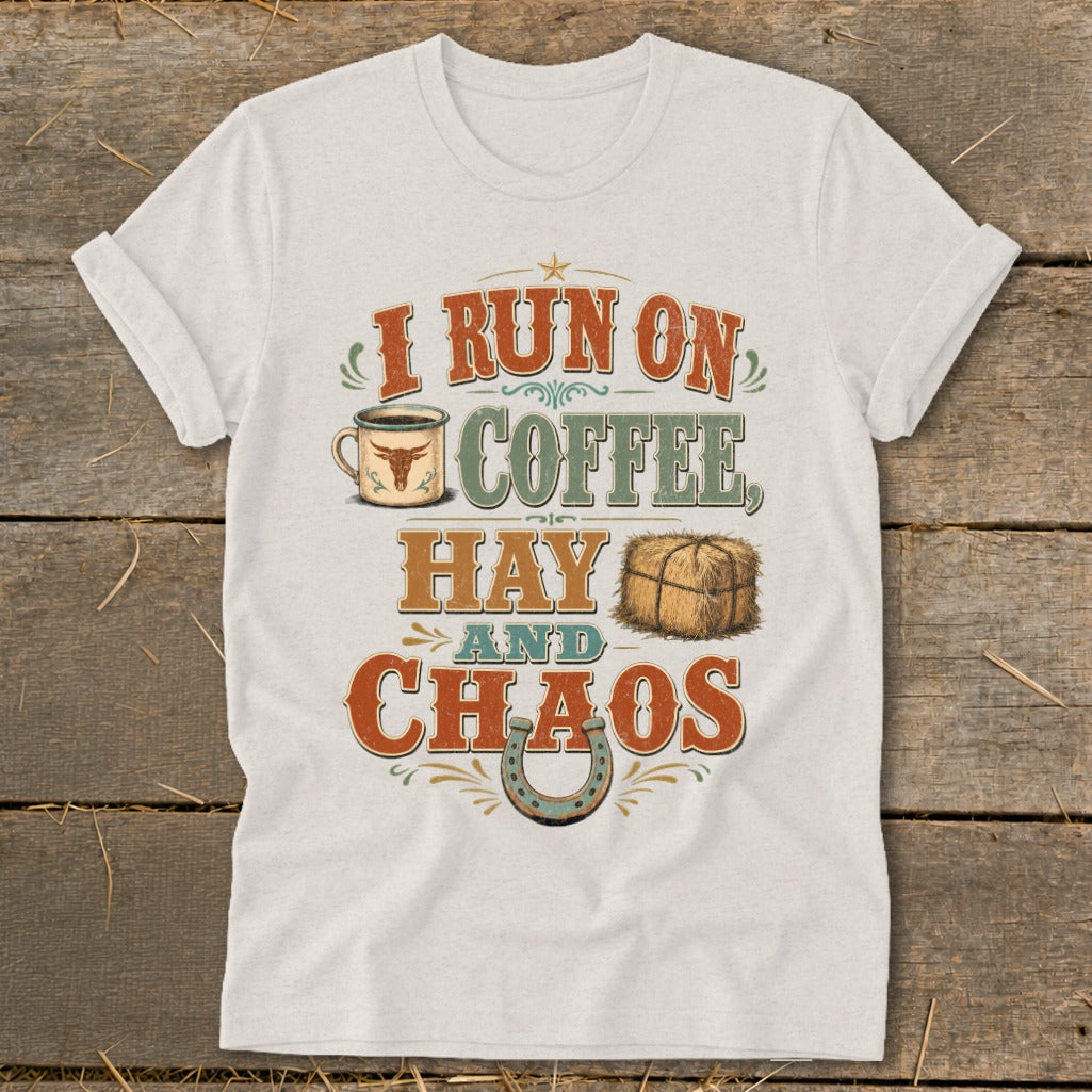Light grey t-shirt with text "I RUN ON COFFEE, HAY AND CHAOS" and graphics.