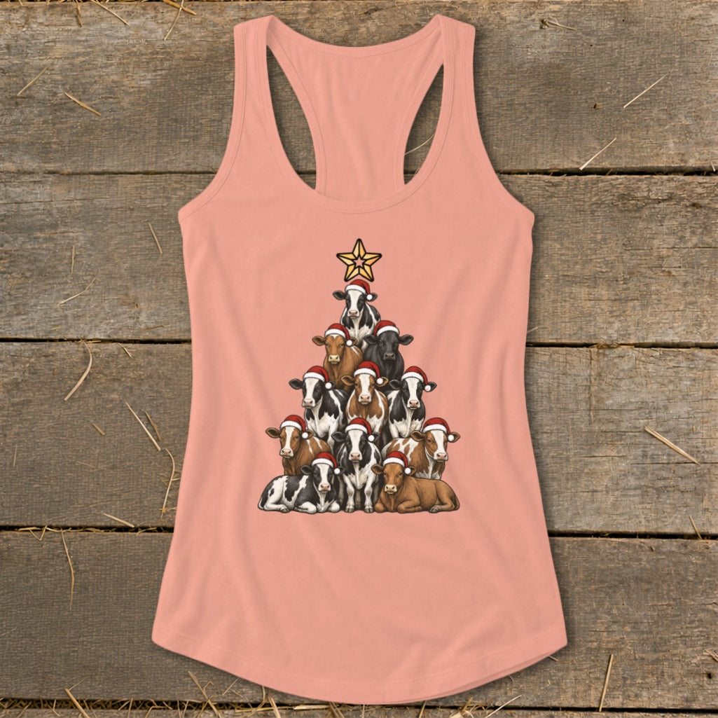 Peach tank top with a Christmas tree made of cows wearing Santa hats and a star.
