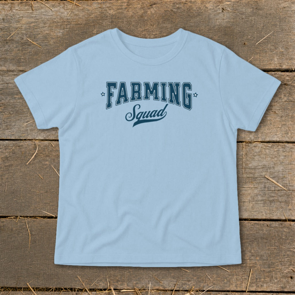 Light blue t-shirt with "FARMING Squad" graphic in navy blue font.