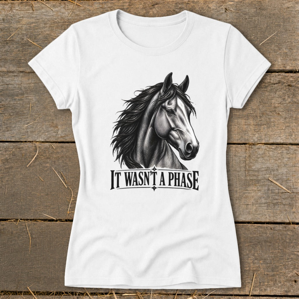 White t-shirt with black and white drawing of a horse's head and "IT WASN'T A PHASE" text.
