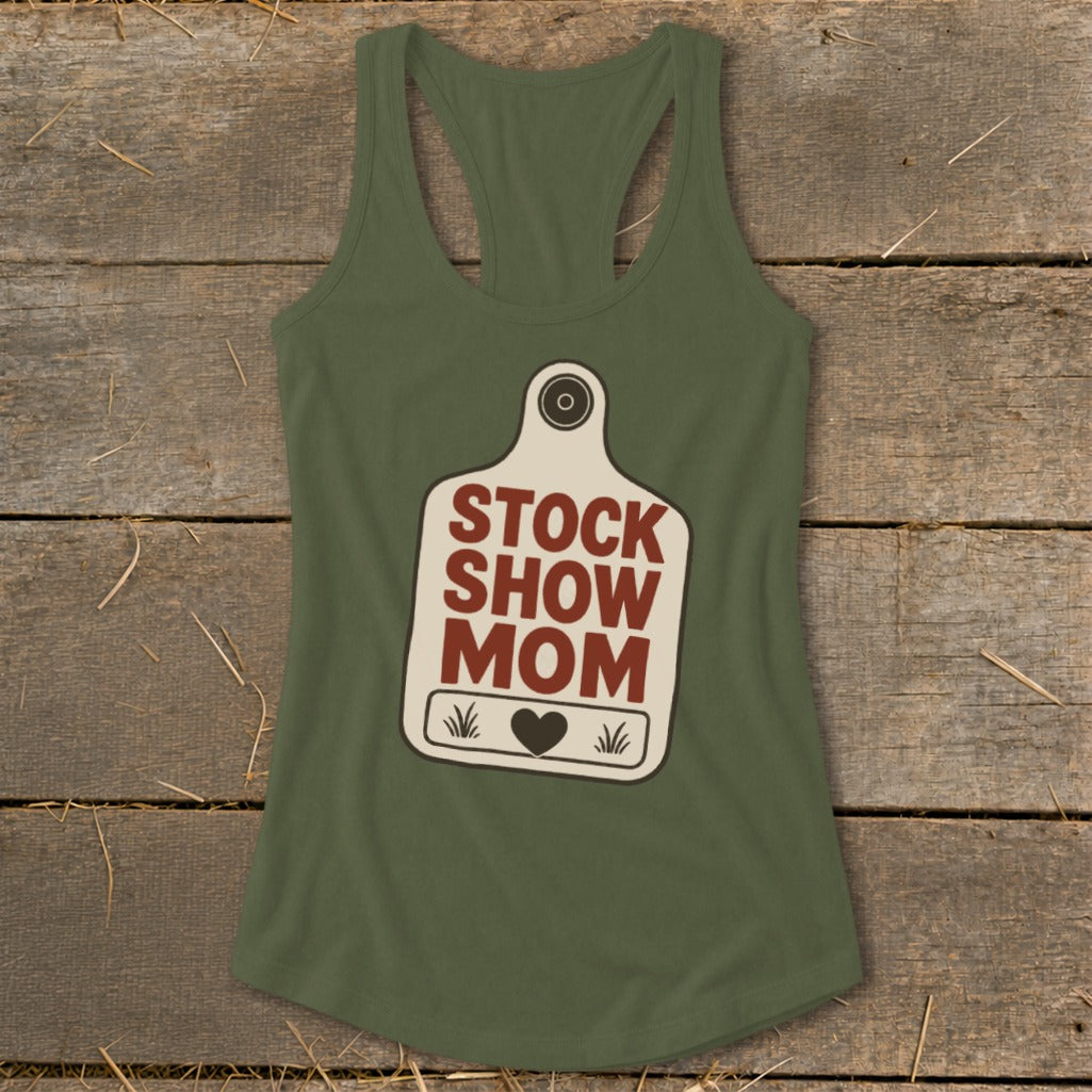 Green tank top with "Stock Show Mom" text on a tag design.