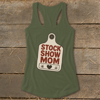 Green tank top with "Stock Show Mom" text on a tag design.