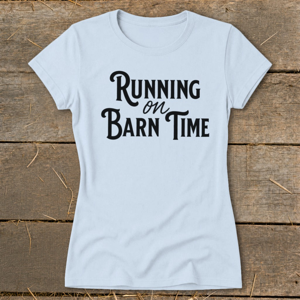 Light blue t-shirt with "Running on Barn Time" text in black lettering.