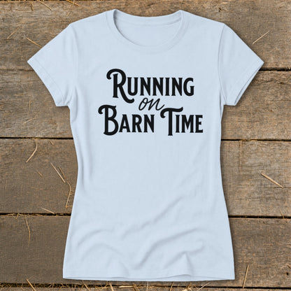Light blue t-shirt with "Running on Barn Time" text in black lettering.
