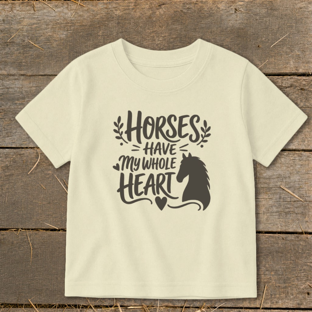 Cream t-shirt with black text "Horses Have My Whole Heart" and horse silhouette.