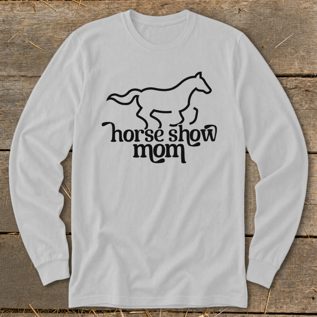 White long sleeve shirt with a black outline of a horse and the text "horse show mom".