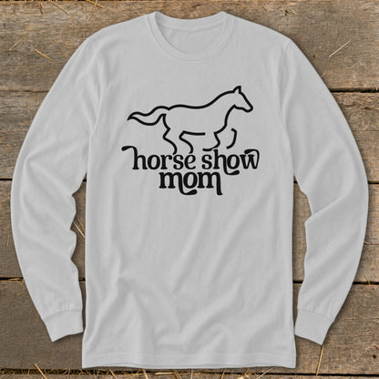 White long sleeve shirt with a black outline of a horse and the text "horse show mom".