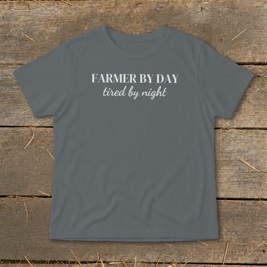 Grey t-shirt with white text reading "FARMER BY DAY tired by night".