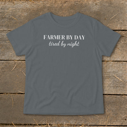 Grey t-shirt with white text reading "FARMER BY DAY tired by night".
