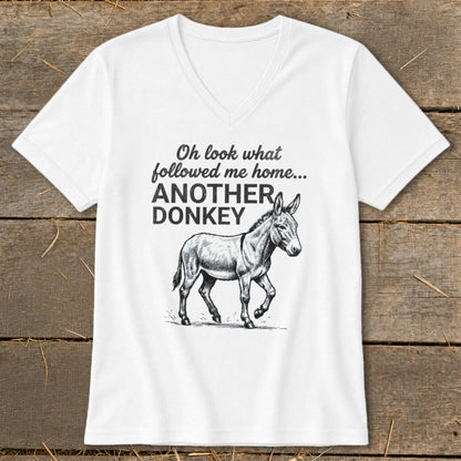 White t-shirt with a sketch of a donkey and text "Oh look what followed me home... ANOTHER DONKEY".