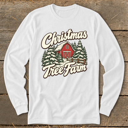 White long-sleeve shirt with "Christmas Tree Farm" text and a winter barn scene.
