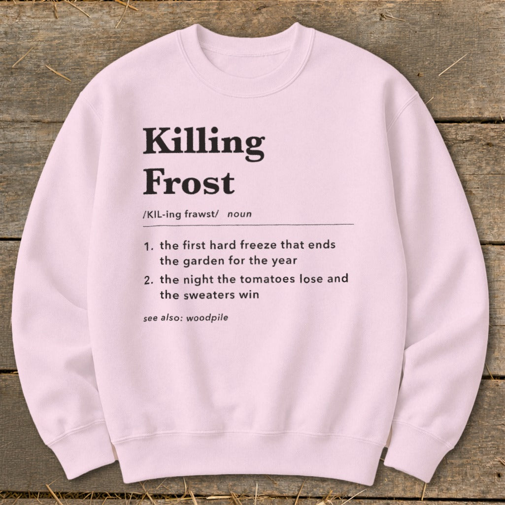 Light pink crewneck sweatshirt featuring a dictionary-style definition of killing frost printed in black.