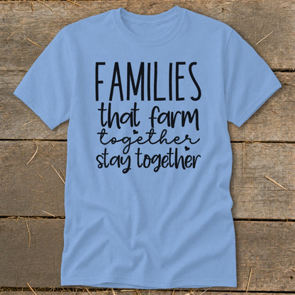 Light blue t-shirt with black text that reads "FAMILIES that farm together stay together".