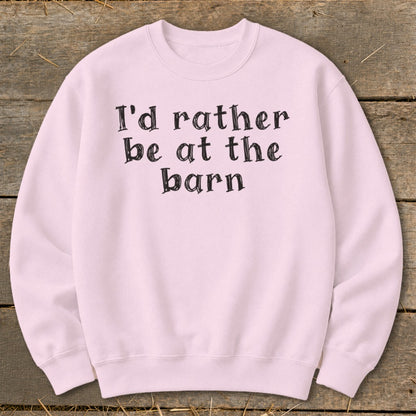 Pink sweatshirt with "I'd rather be at the barn" text