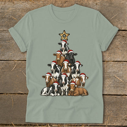 Christmas tree made of cows wearing Santa hats with a star topper.