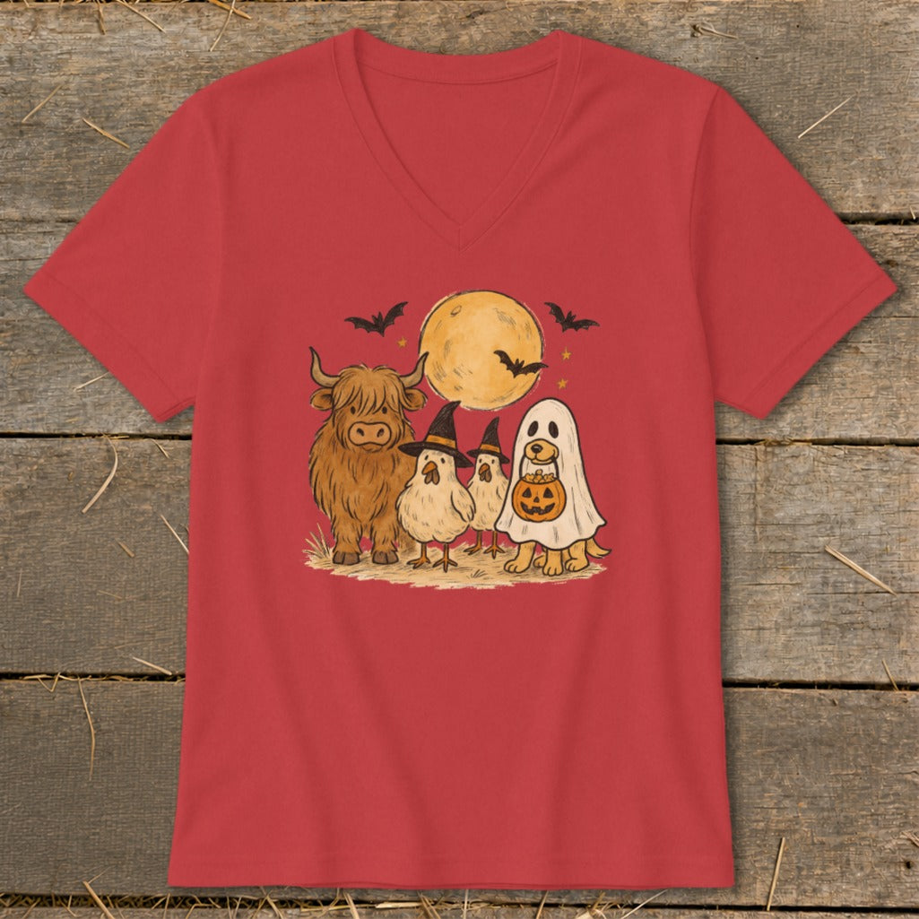 Halloween t-shirt with highland cow, chicks in witch hats, and dog in ghost costume.