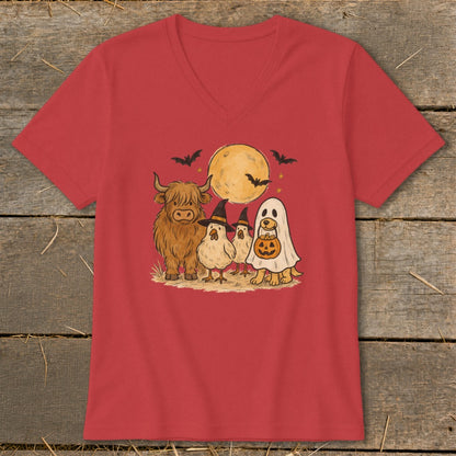 Halloween t-shirt with highland cow, chicks in witch hats, and dog in ghost costume.