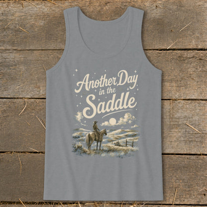 Gray tank top with "Another Day in the Saddle" text and cowboy on horseback graphic.