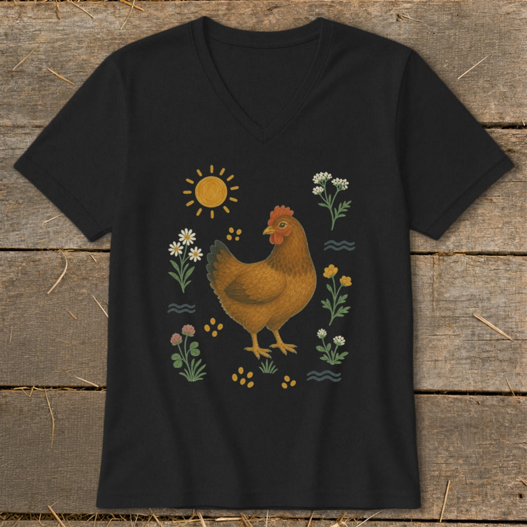 Black t-shirt with a brown chicken illustration and surrounding wildflowers.