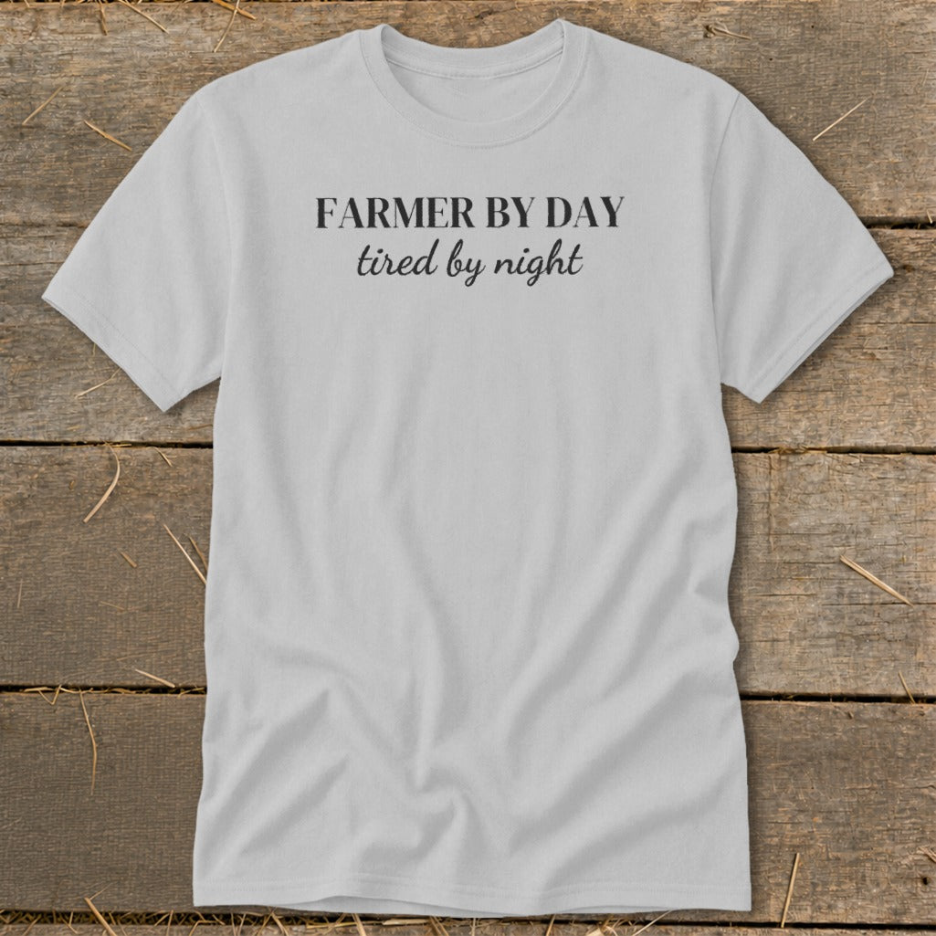 Light gray t-shirt with black text "FARMER BY DAY tired by night".