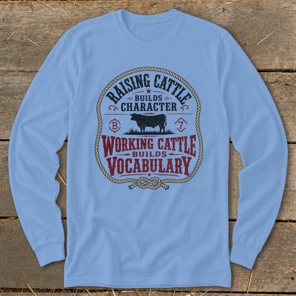 Light blue long sleeve shirt with "Raising Cattle Builds Character" and "Working Cattle Builds Vocabulary" text.