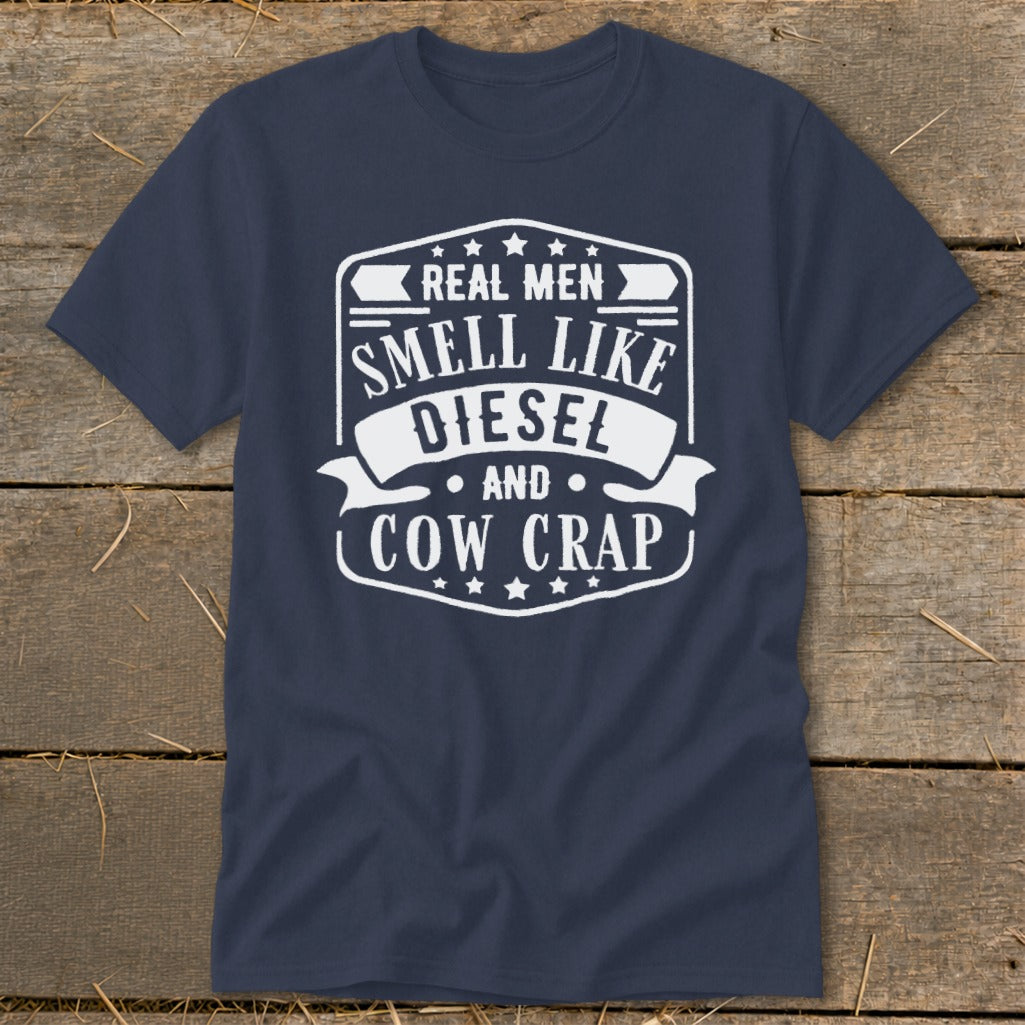 Navy t-shirt with white text: "Real Men Smell Like Diesel And Cow Crap".