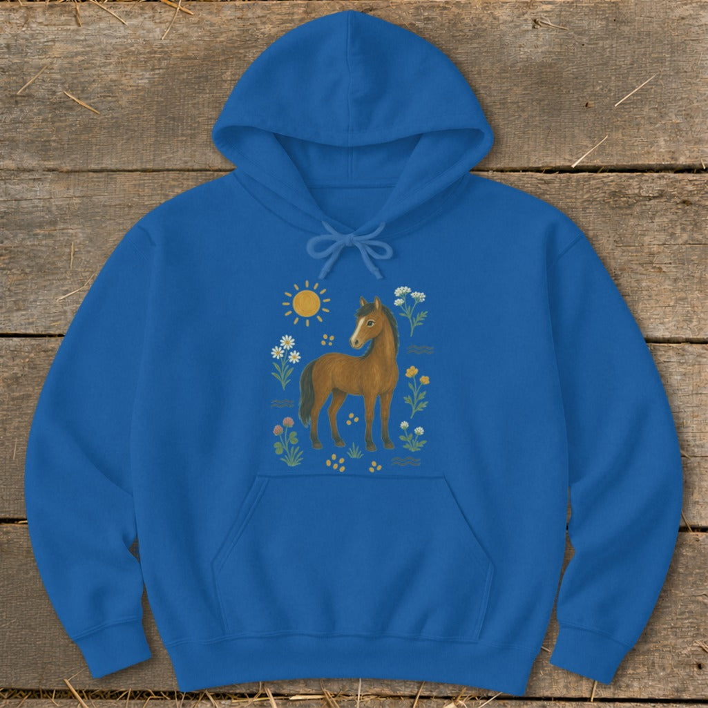 Blue hoodie with a brown horse surrounded by flowers and a sun illustration.