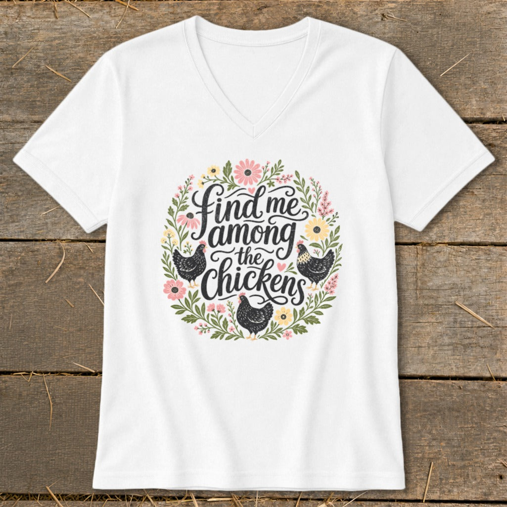 White t-shirt with "Find me among the Chickens" and floral chicken graphic.