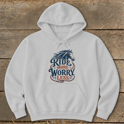 White hoodie with "Ride More Worry Less" text and horse graphic.