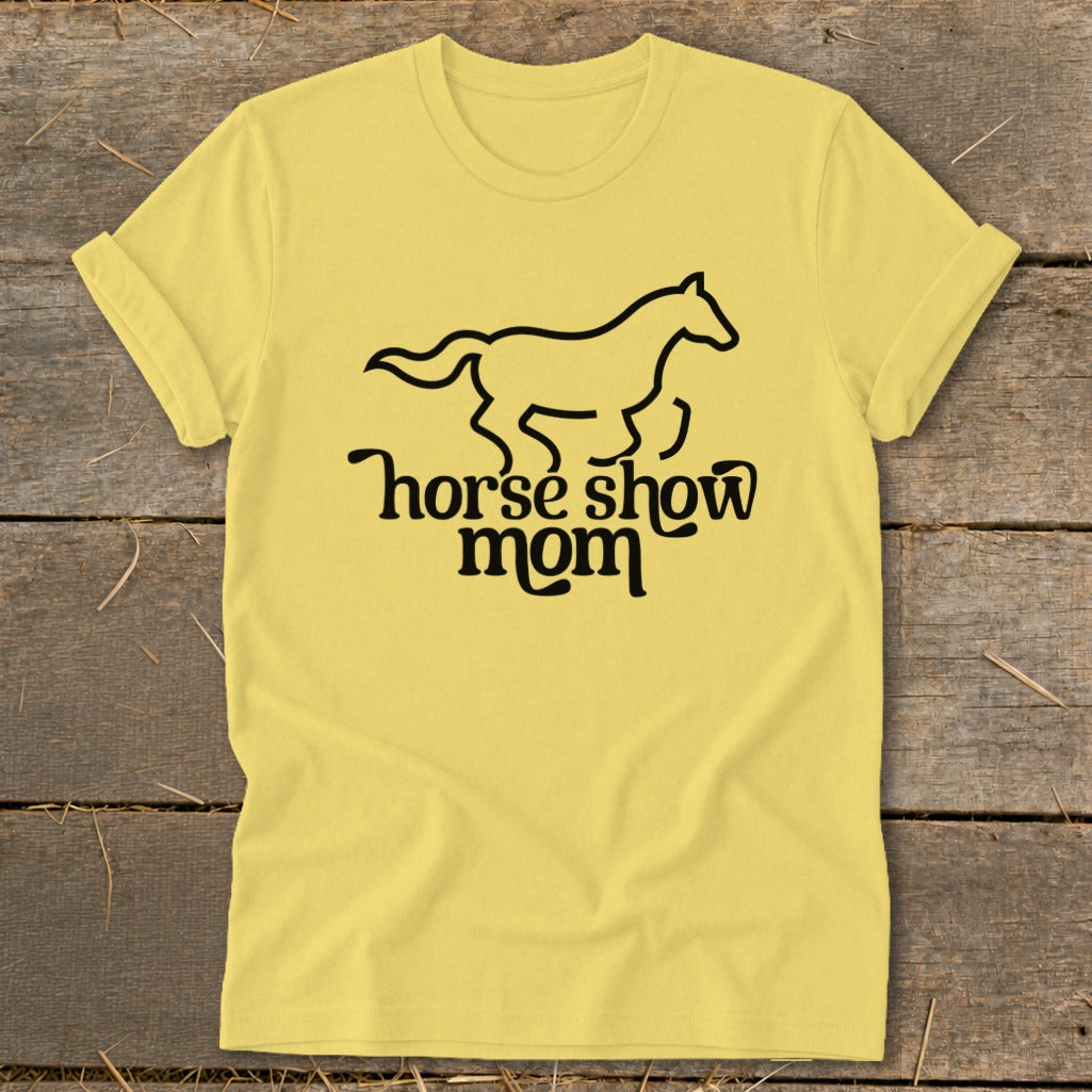 Yellow t-shirt with black horse outline and text "horse show mom."
